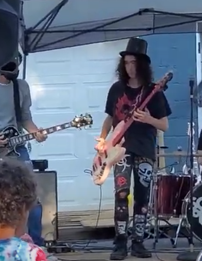 Me playing at a block party with SoR