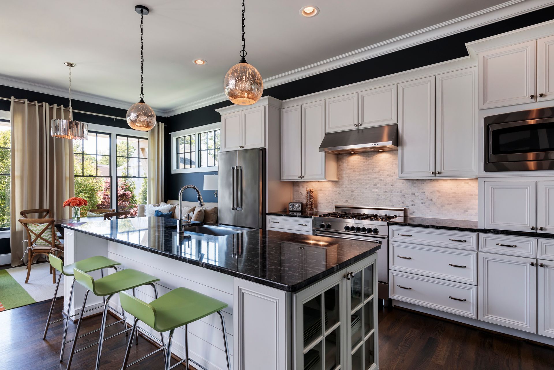 Contemporary kitchen interior showcasing a central island with a built-in sink.
