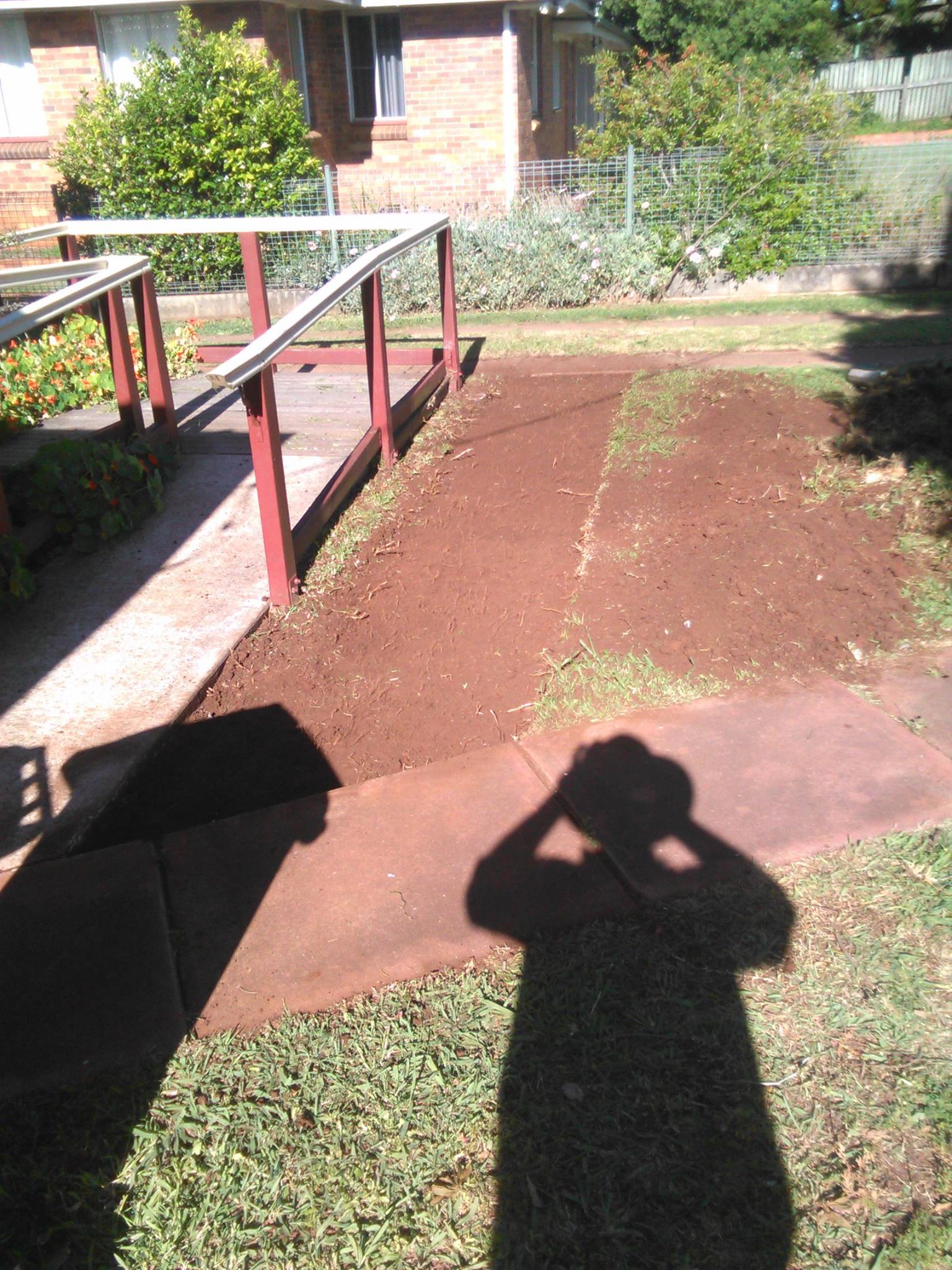 A little pathway extension dug out by hand ready for concrete pouring