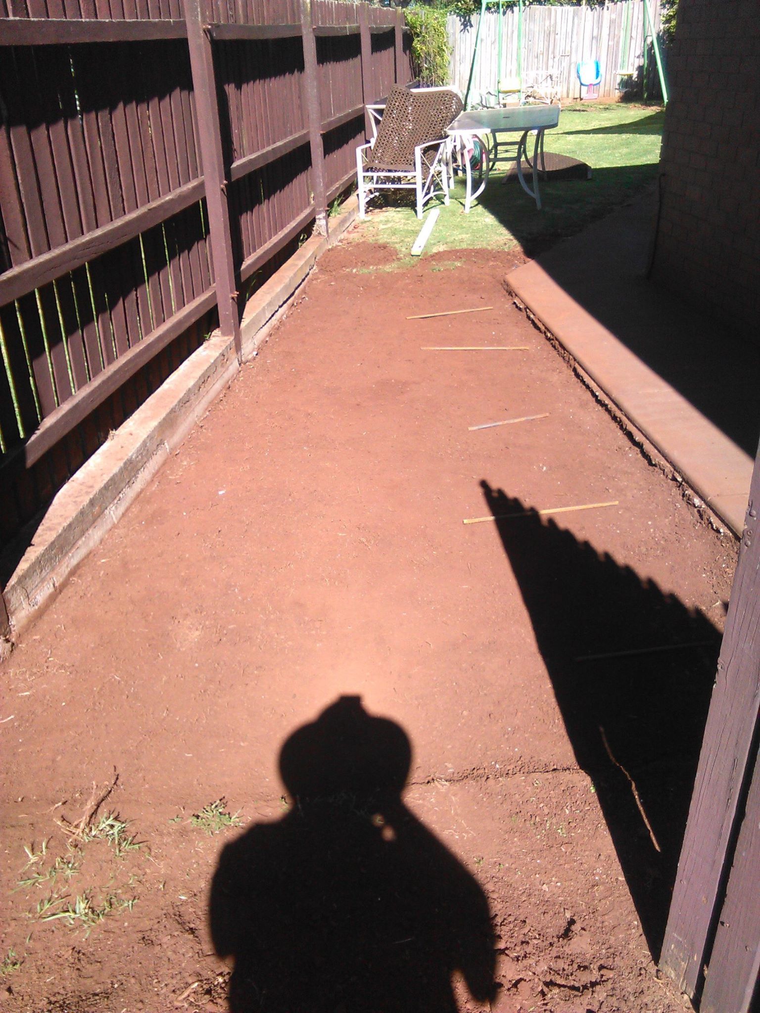 A little pathway extension dug out by hand ready for concrete pouring