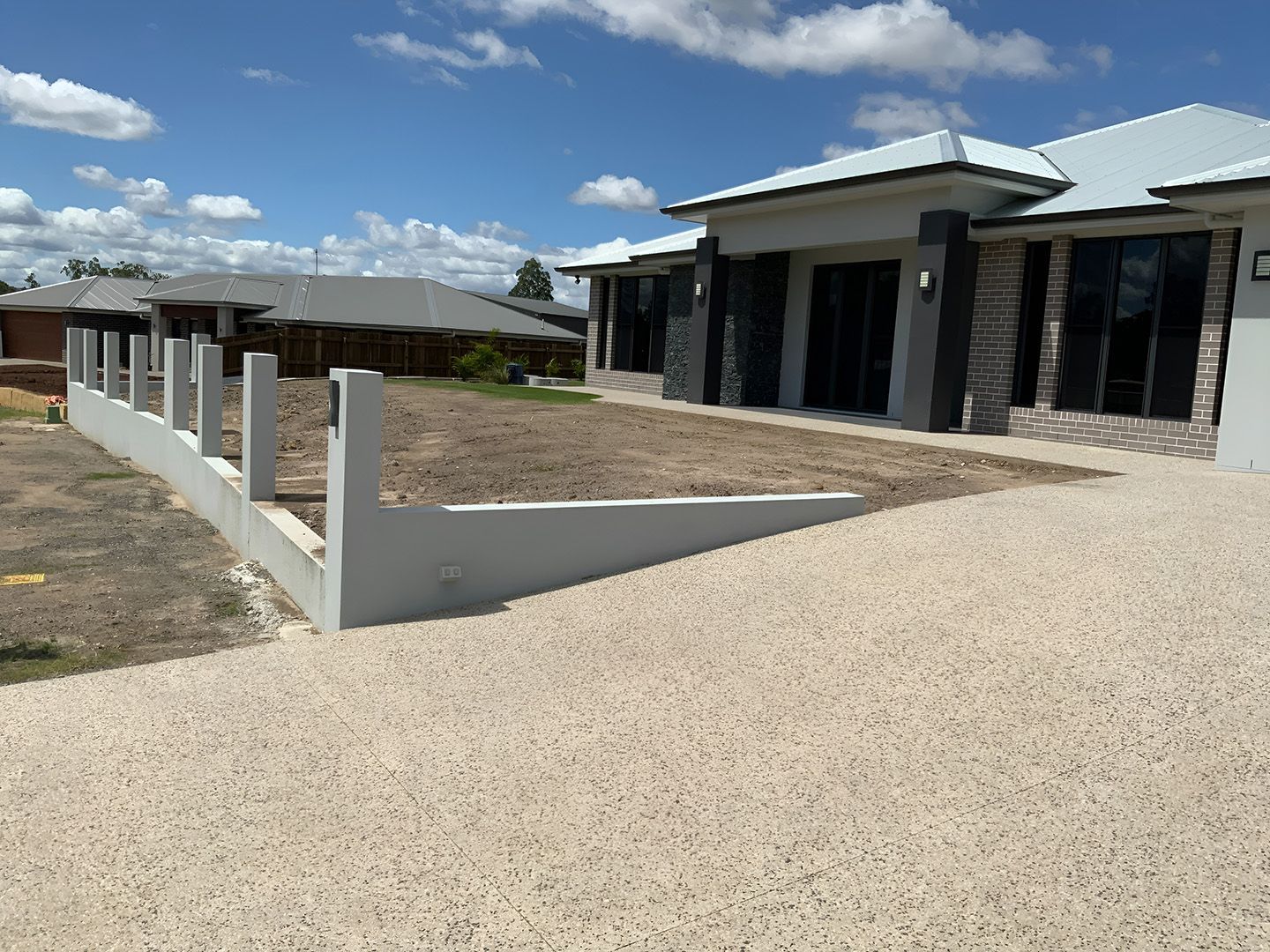 Exposed Aggregate Concrete Driveway Installed By Professional Concreters In Toowoomba