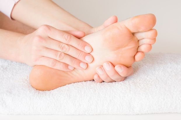 Podiatry — Person Touching His Foot in Ladson, SC