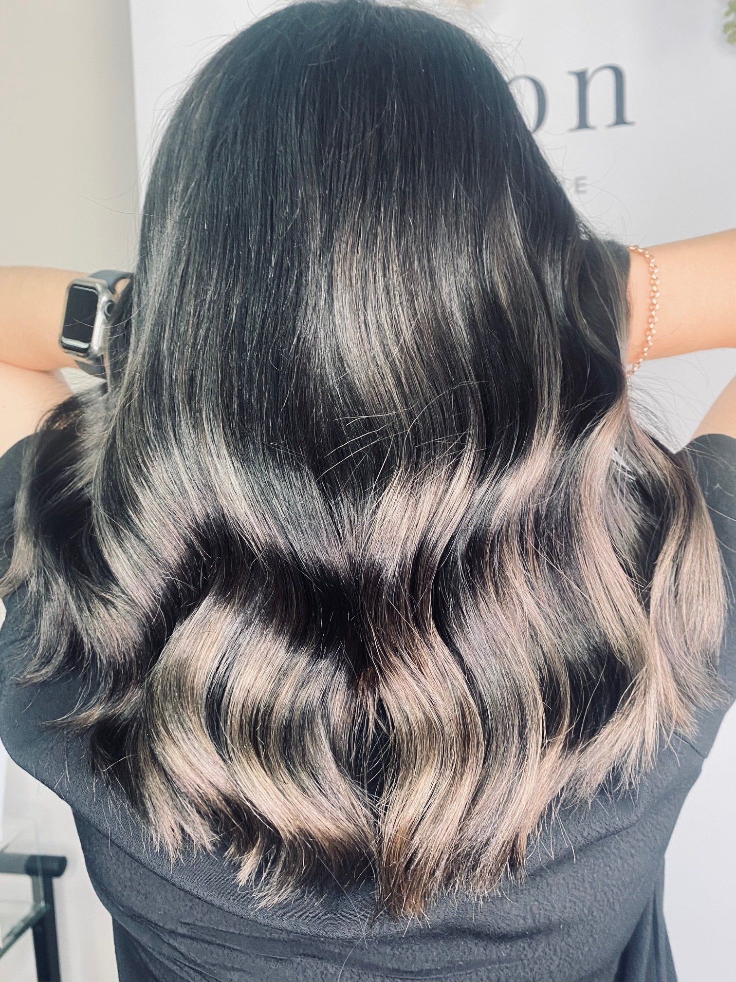 The back of a woman 's head with long black hair - Hairdresser in Mackay, QLD