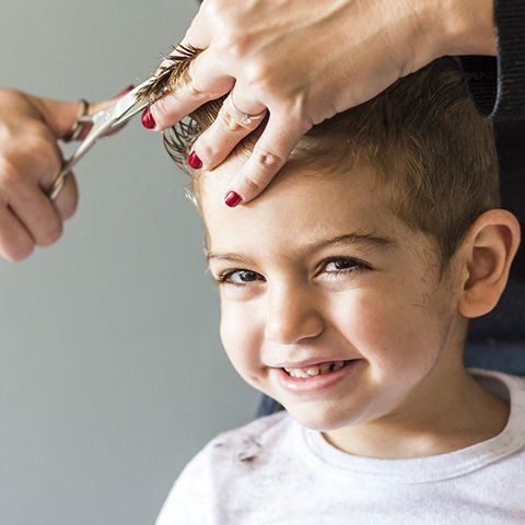 Kid Getting Haircut - Hairdresser in Mackay, QLD
