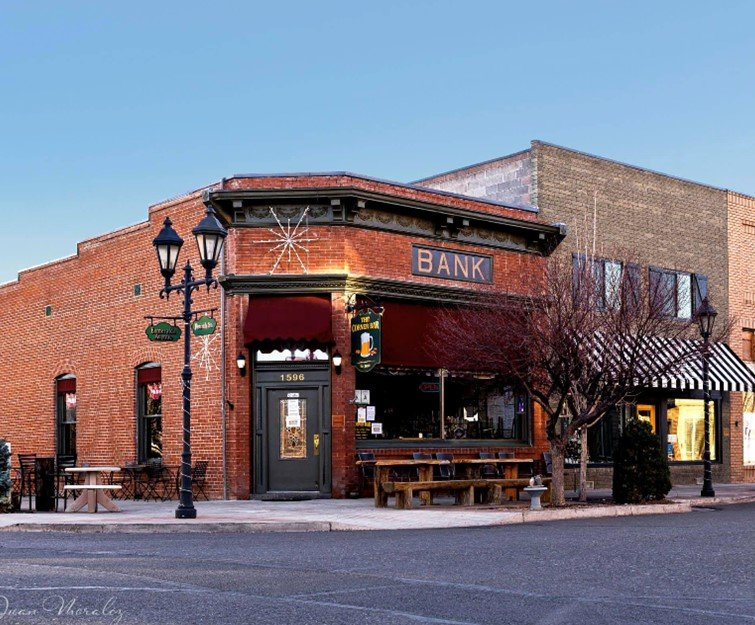 A brick building with the word bank on it
