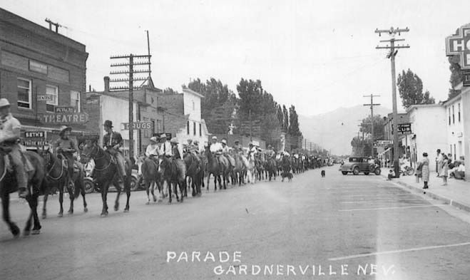 A black and white photo of a parade in gardnerville new york