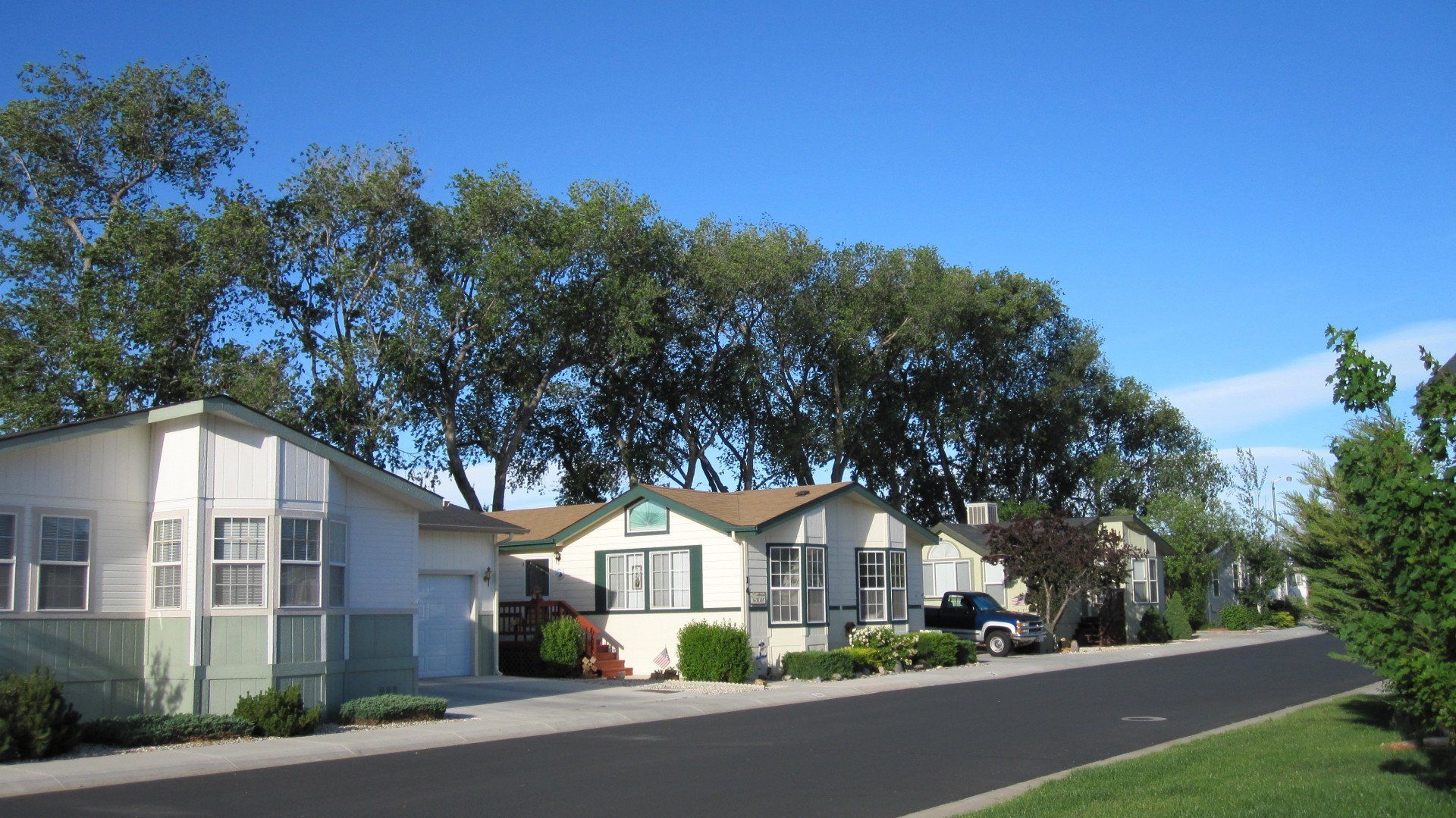 A row of mobile homes on a sunny day