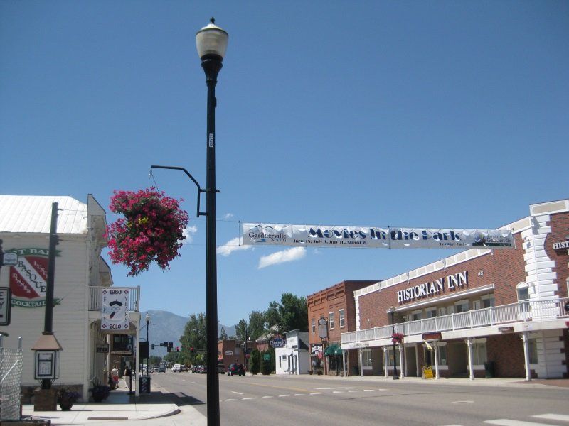 A street with a sign that says charles in the look