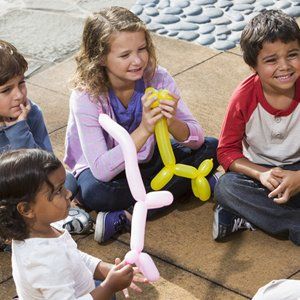 group of children with balloon animals
