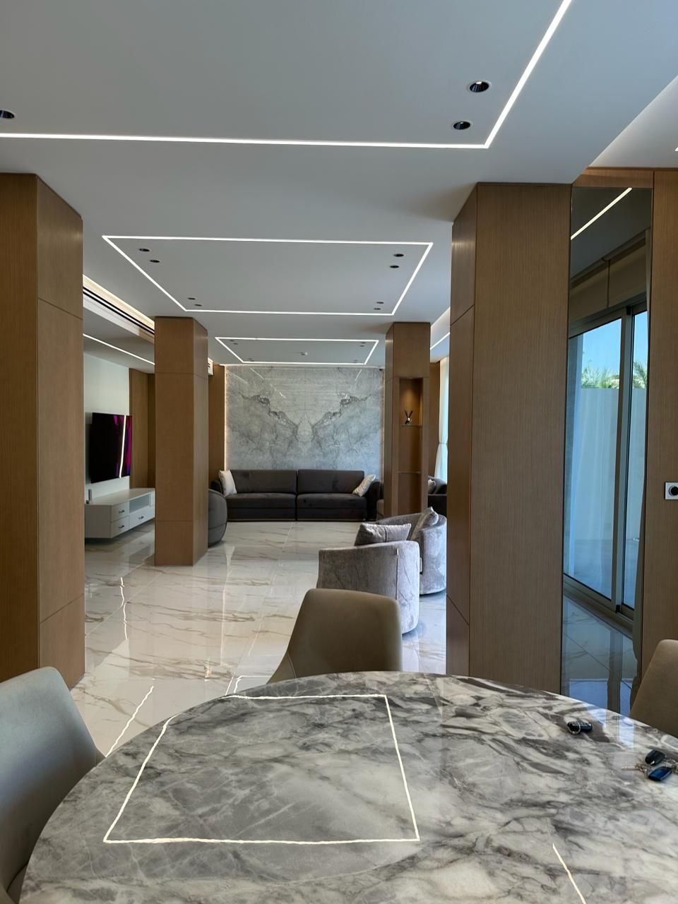 Luxury living room interior renovation in Jumeirah Park Dubai by Concept Art Decor.