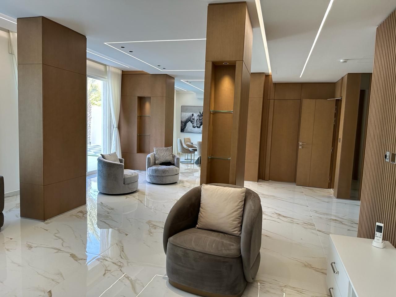 Villa lounge interior fit-out in Jumeirah Park Dubai executed by Concept Art Decor.