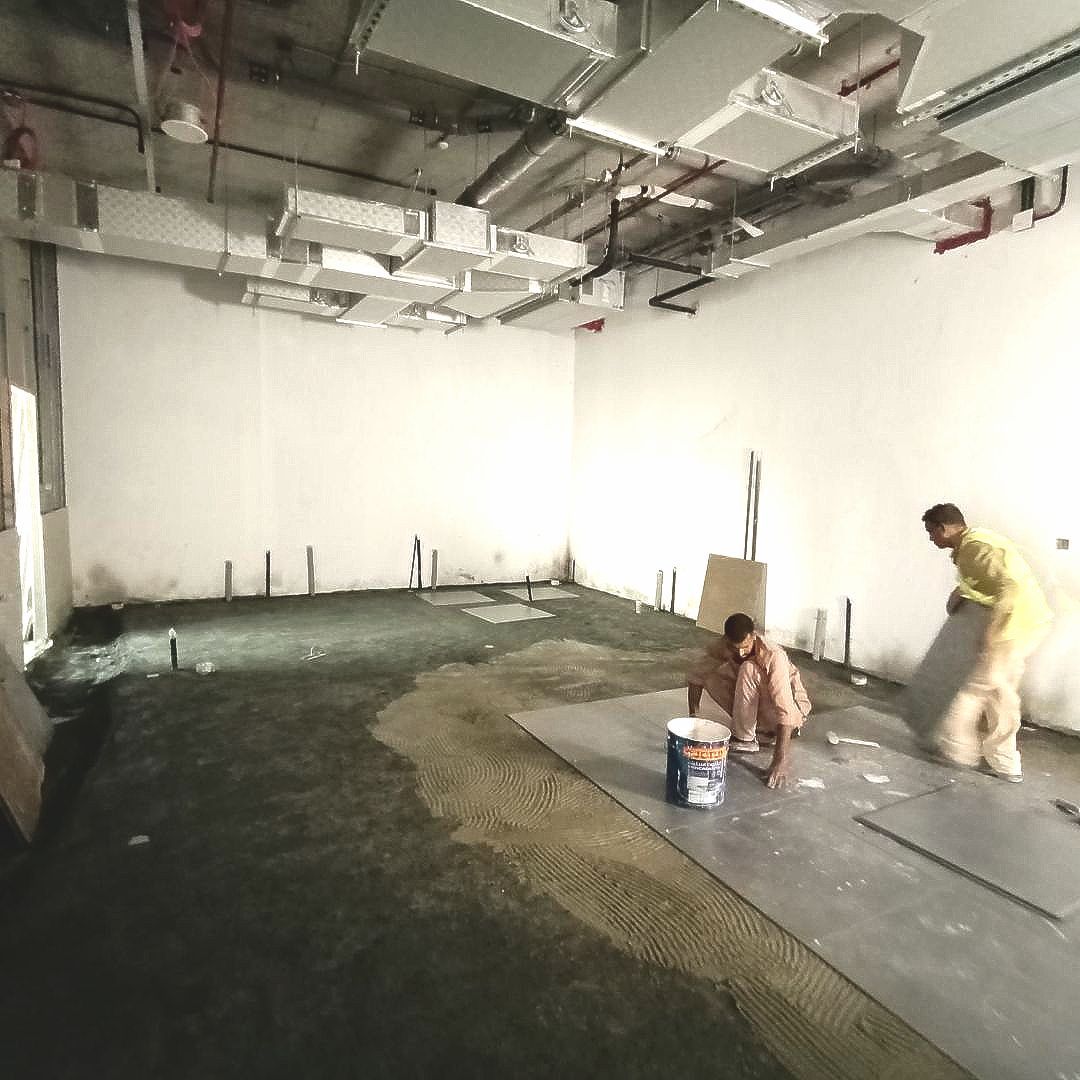 Work in progress for Grohe Service Center in Dubai. Screeding works being made by Concept Art Deco Dubai