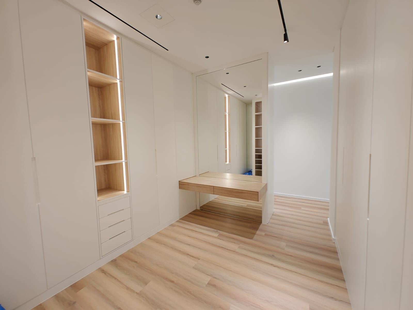 Her walk-in closet with bespoke wardrobe joinery in Dubai villa, executed by Concept Art Decor.