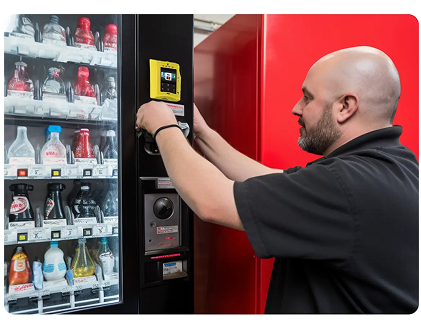 Man operating a vending machine, likely refilling or servicing it.