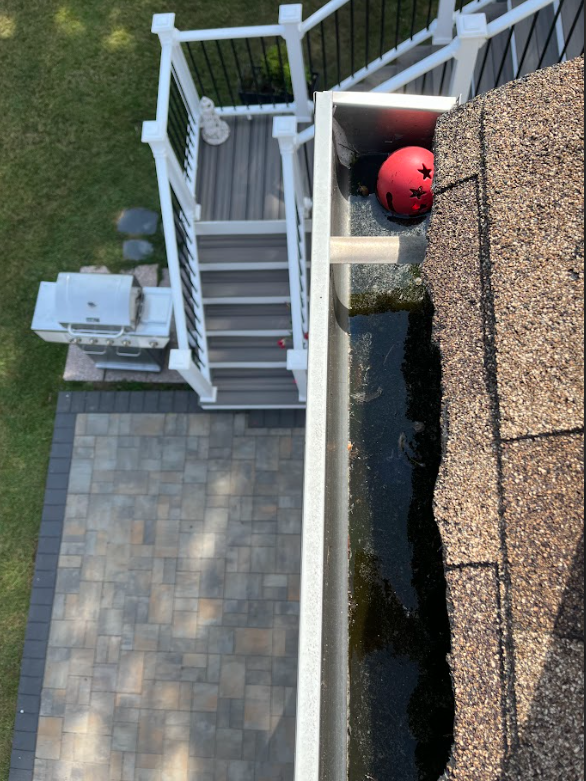 An aerial view of a gutter with a red ball in it