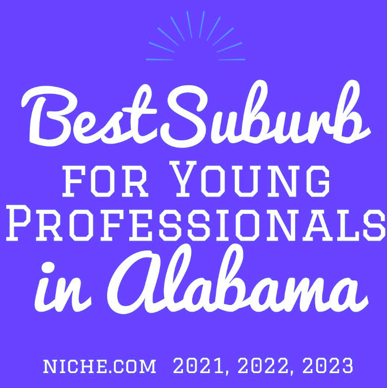 A purple sign that says best suburb for young professionals in alabama