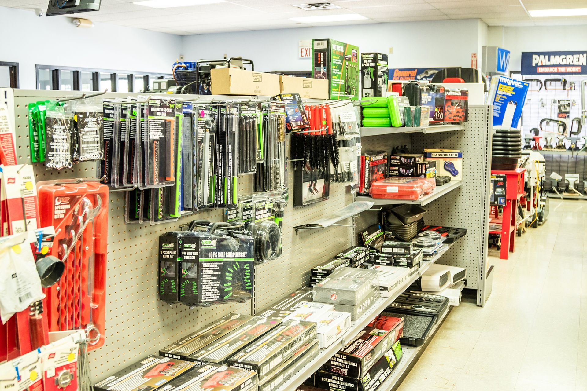 A store filled with shelves filled with lots of tools.