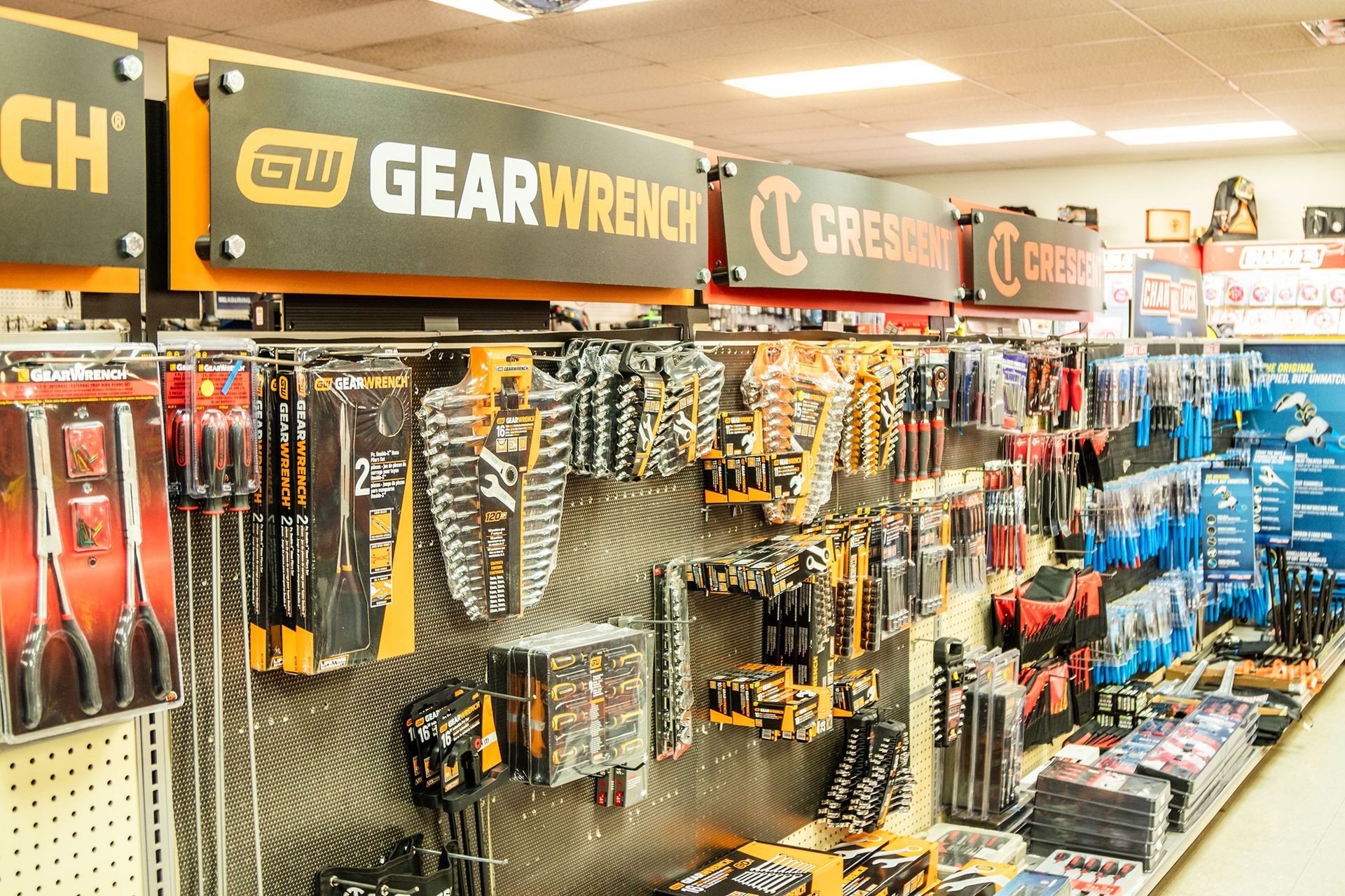 A store display of tools including a gear wrench