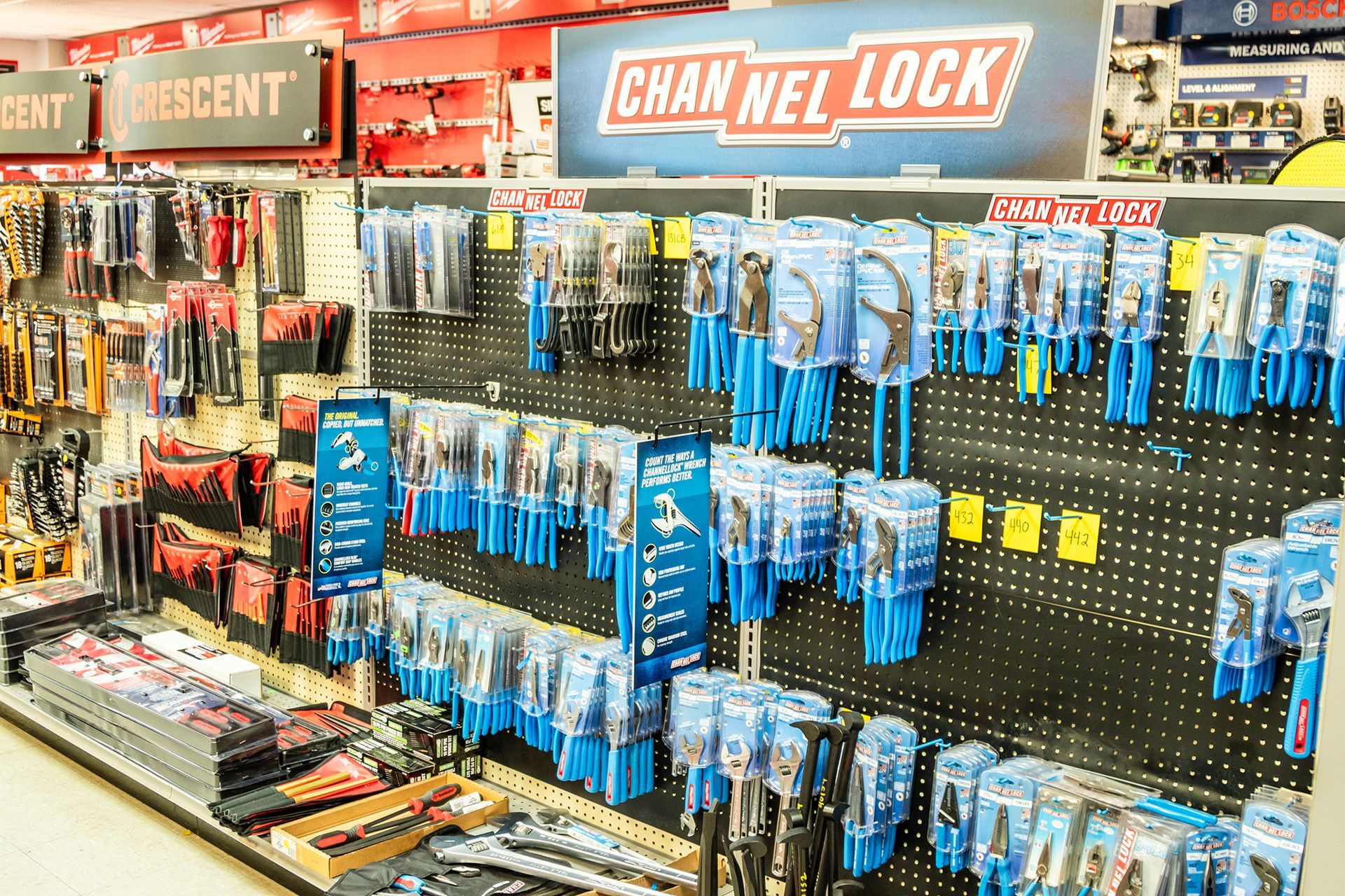 A store filled with lots of tools and a sign that says channel lock.