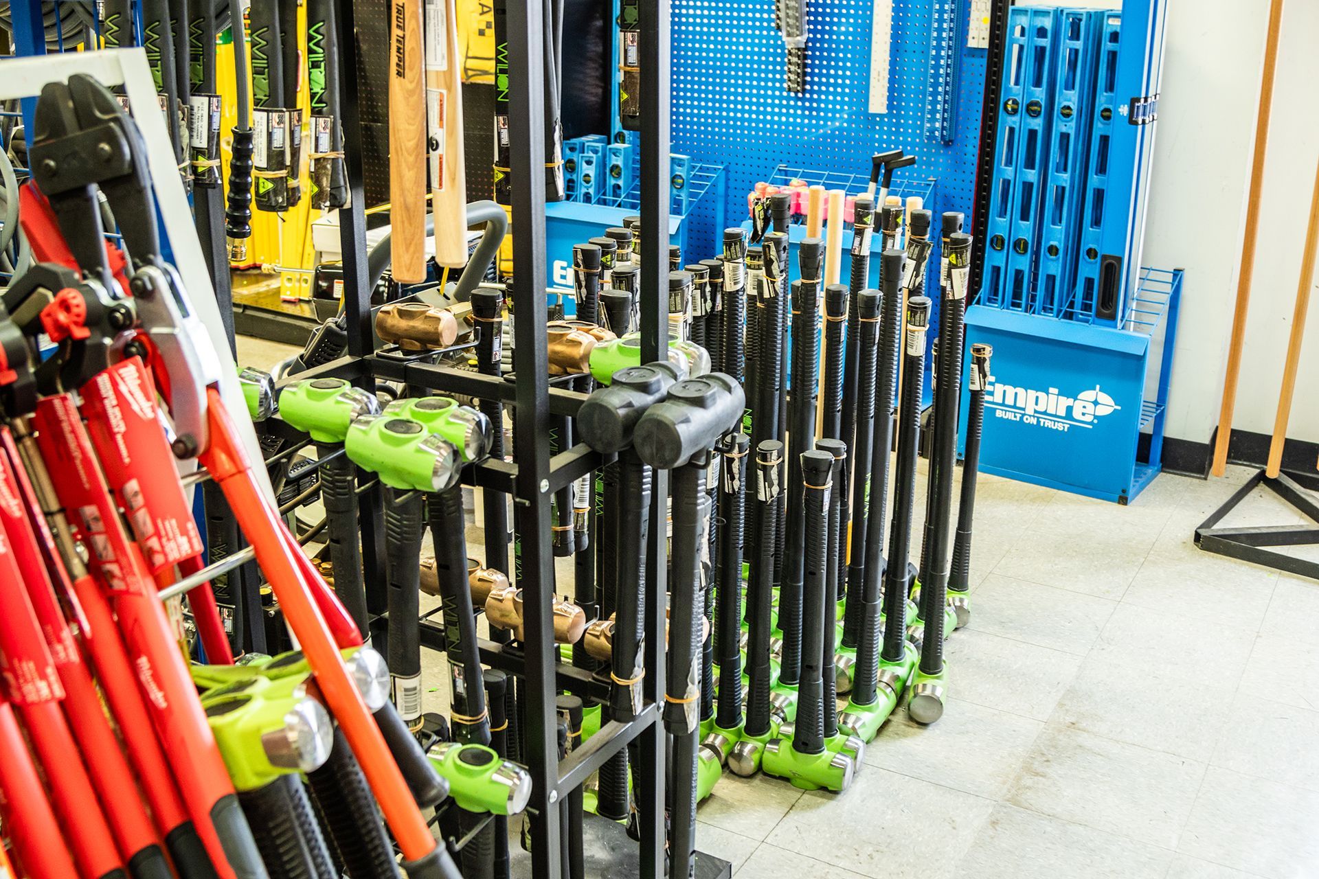 A bunch of tools are stacked on top of each other in a room.