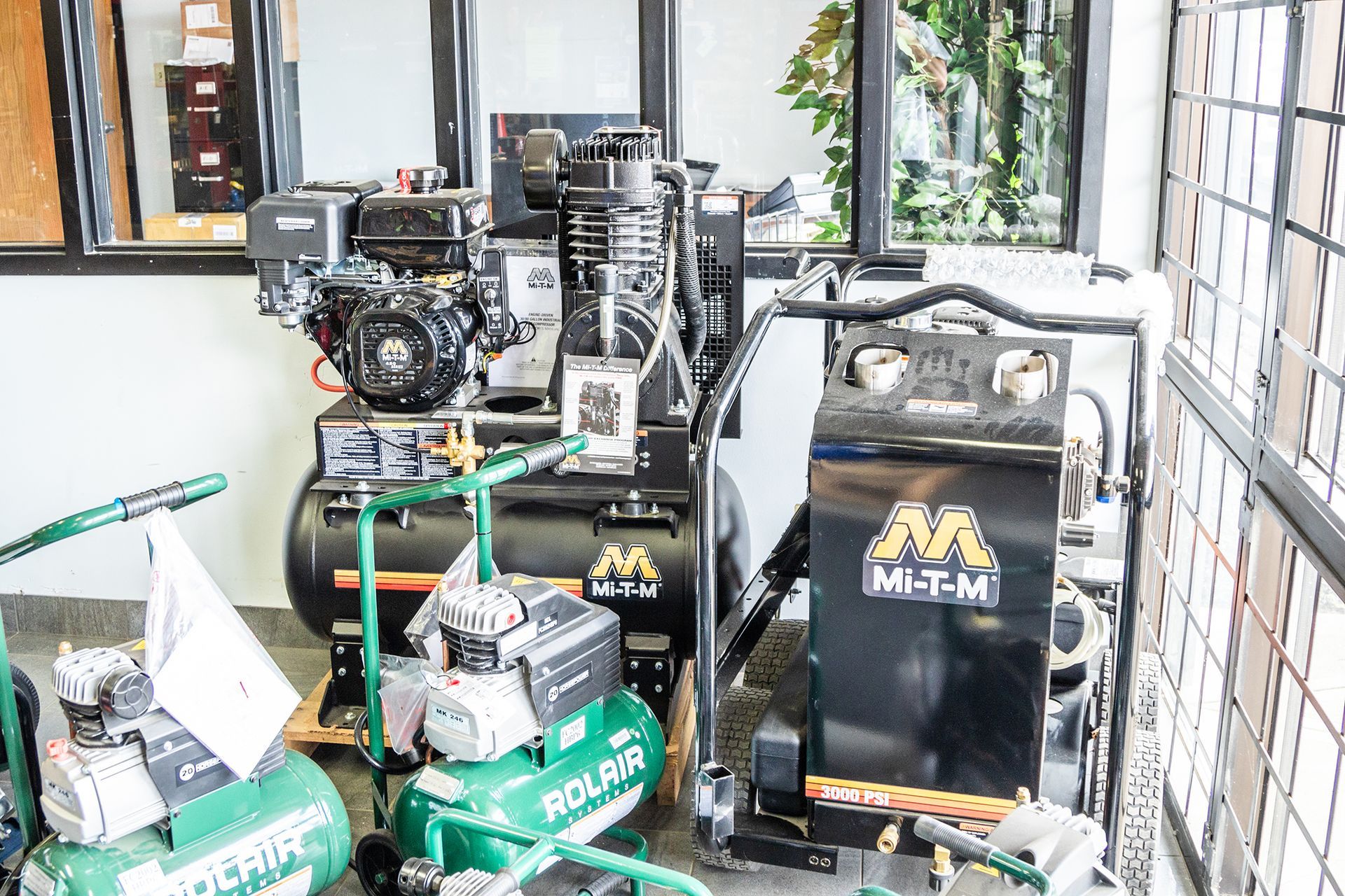 There are many different types of air compressors in this room.