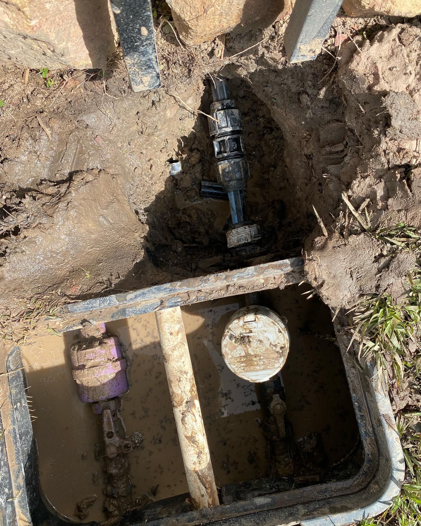 Open Irrigation Valve Box With Exposed Pipes — C’s Plumbing & Gas Gold Coast in Yatala, QLD