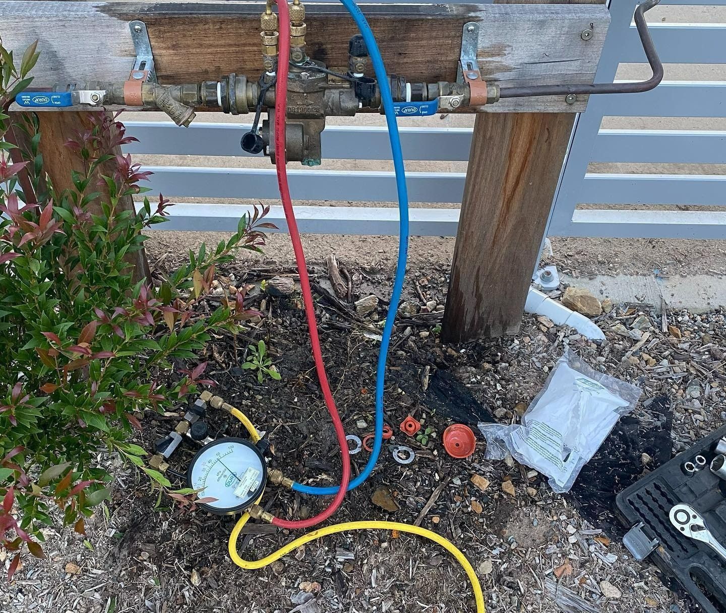 Pipes With Red and Blue Hoses — C’s Plumbing & Gas Gold Coast in Logan, QLD