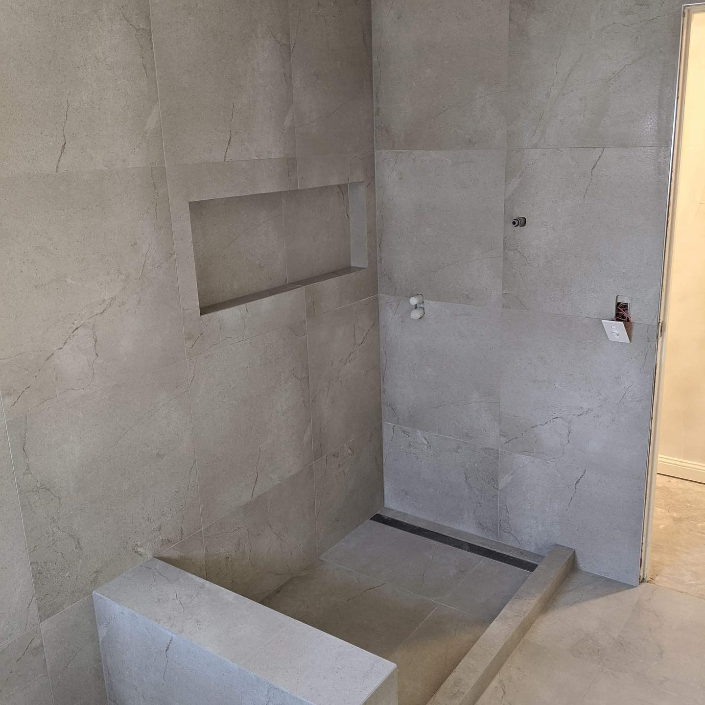 Shower With Gray Stone Tiles Being Renovate — C’s Plumbing & Gas Gold Coast in Yatala, QLD
