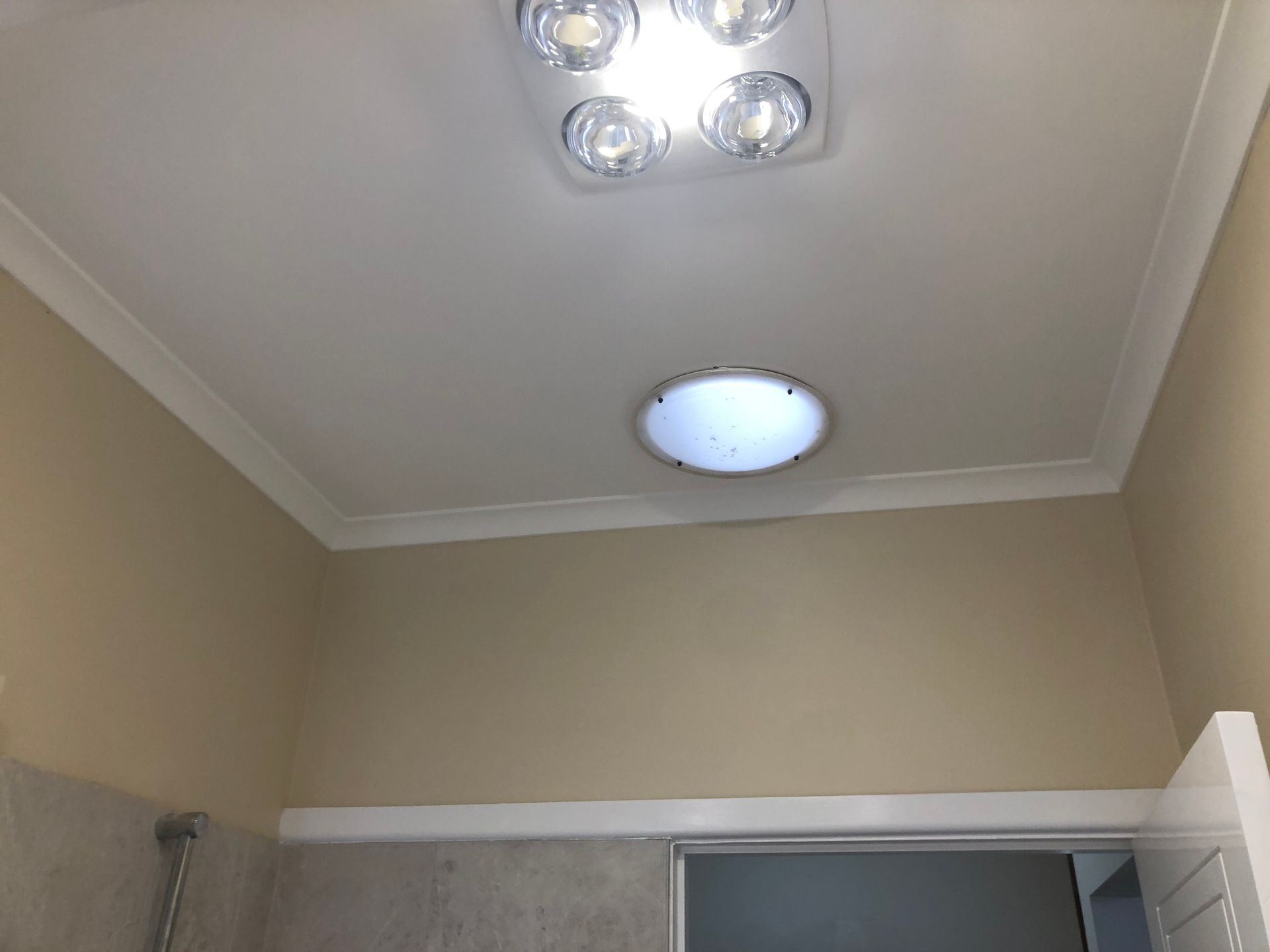 A Living Room With A Fireplace And Lots Of Windows — Recoat Painting In West Wodonga, VIC