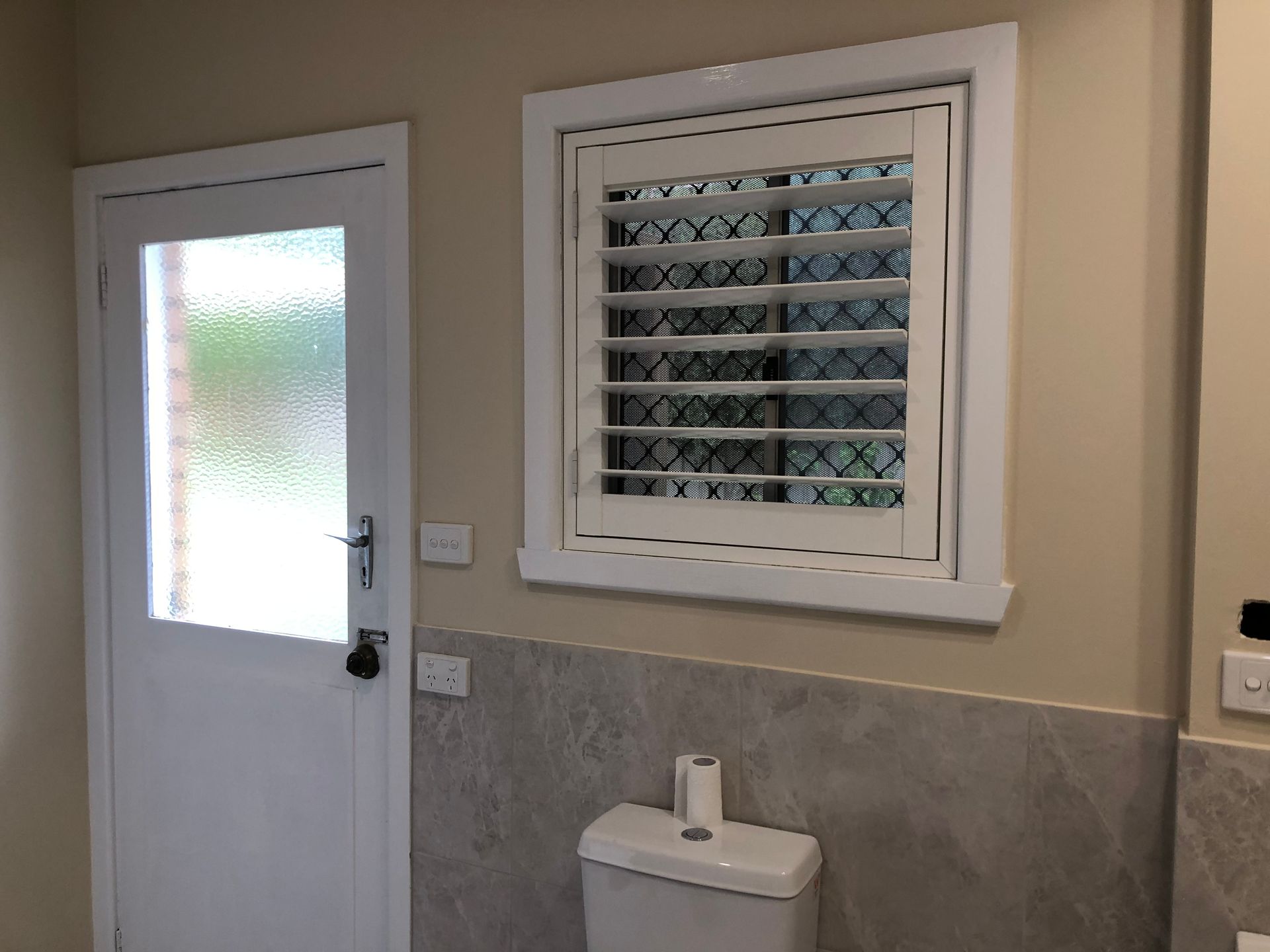 A Room With White Brick Walls And A Window — Recoat Painting In West Wodonga, VIC