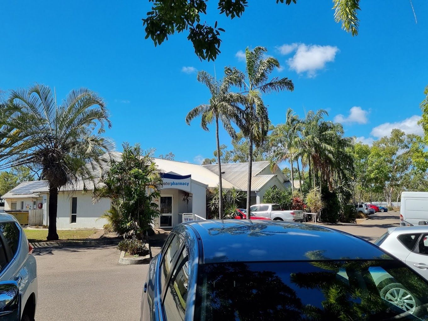 A Sign for Bluewater Pharmacy Has a Phone Number on It — Bluewater Pharmacy in Yabulu, QLD
