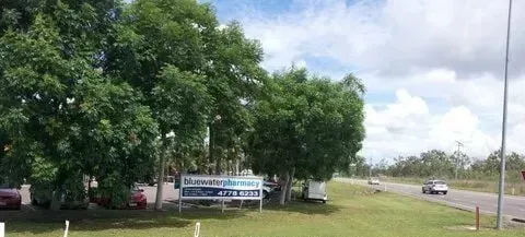 A Sign on the Side of the Road Says Highway View Looking North to South — Bluewater Pharmacy in Yabulu, QLD