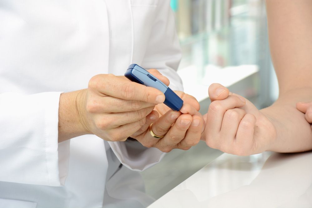 someone is getting tested for diabetes — Bluewater Pharmacy in Yabulu, QLD