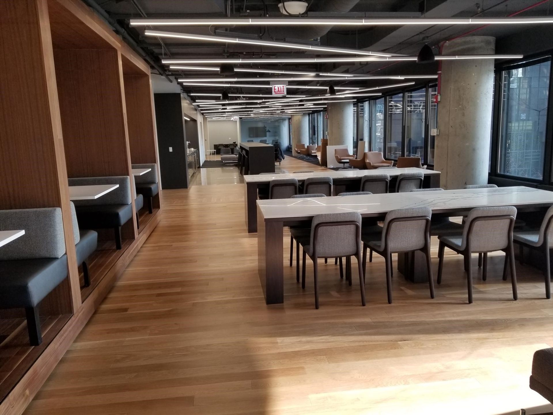 A large room with tables and chairs in it