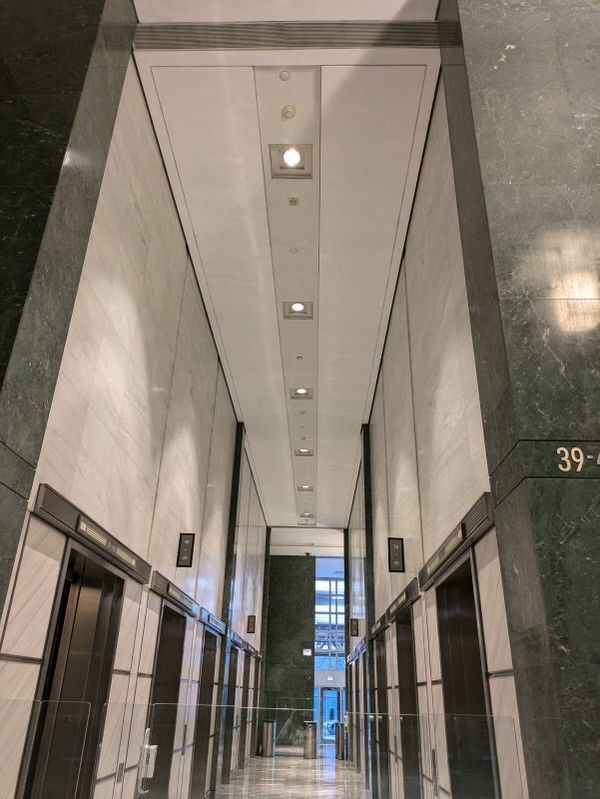 A hallway in a building with the number 39 on the wall