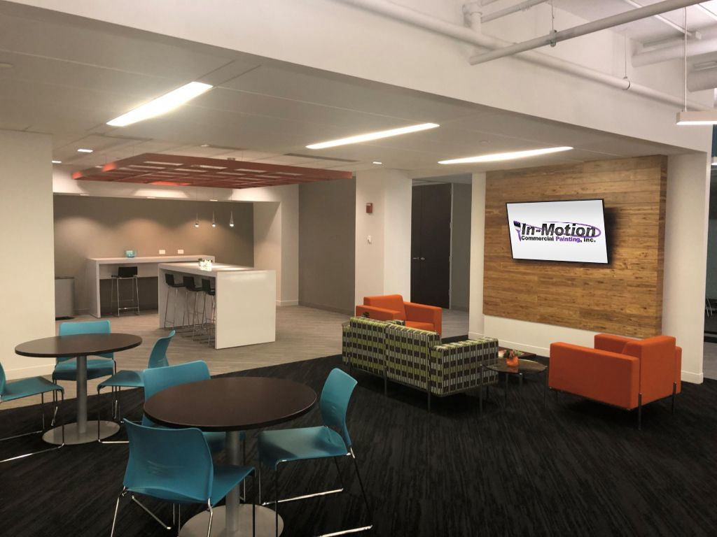 A living room with tables and chairs