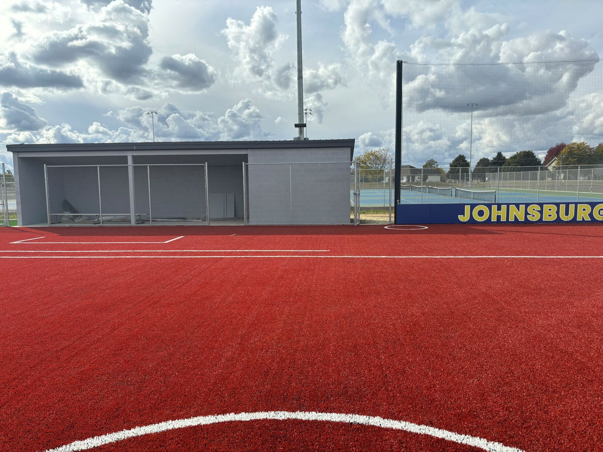 A soccer field with a sign that says johnsburg on it