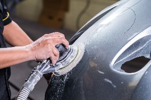 Mechanic cleaning car — Waipahu, HI — Westside Fender/Body & Refinishing