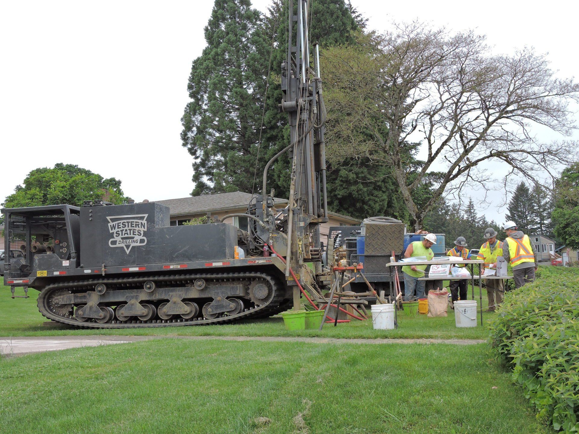Well Monitoring Services  — Men Drilling Over Water in Hubbard, OR