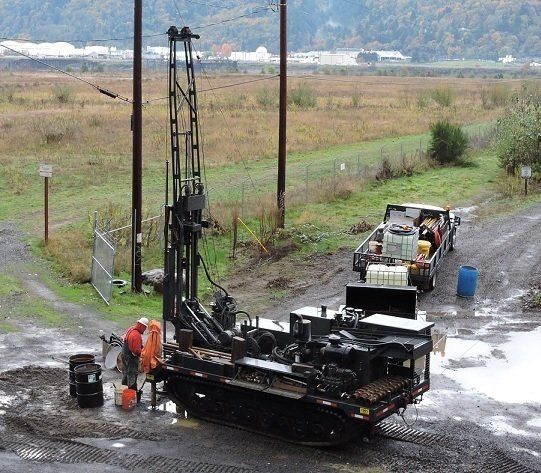 Terrain Drilling Services  — Men Working on Rough Terrain Drill in Hubbard, OR