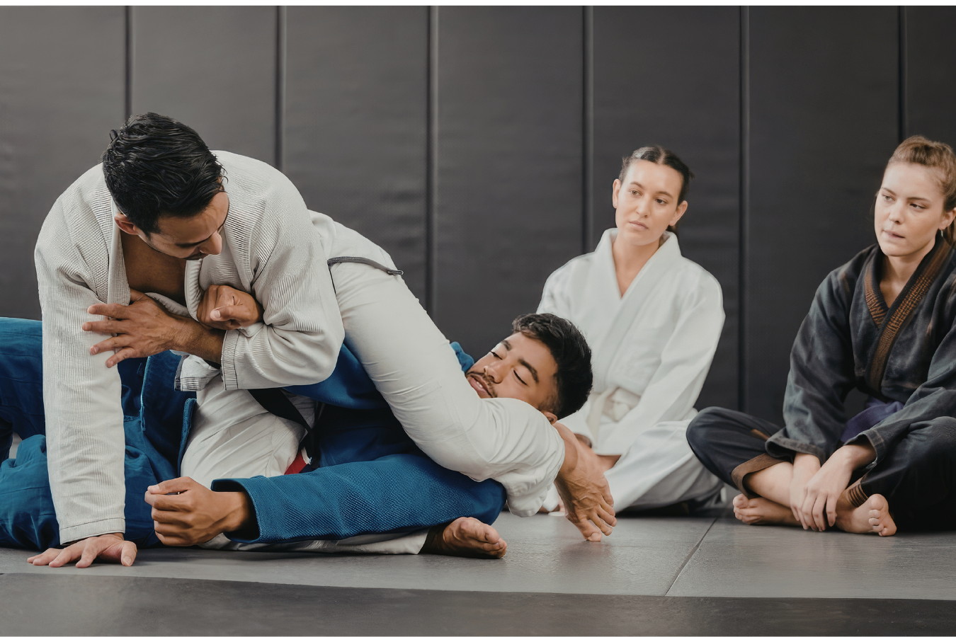 Adults drilling Jiu-Jitsu techniques at Almighty Jiu-Jitsu in Huntington Beach, CA to build strength