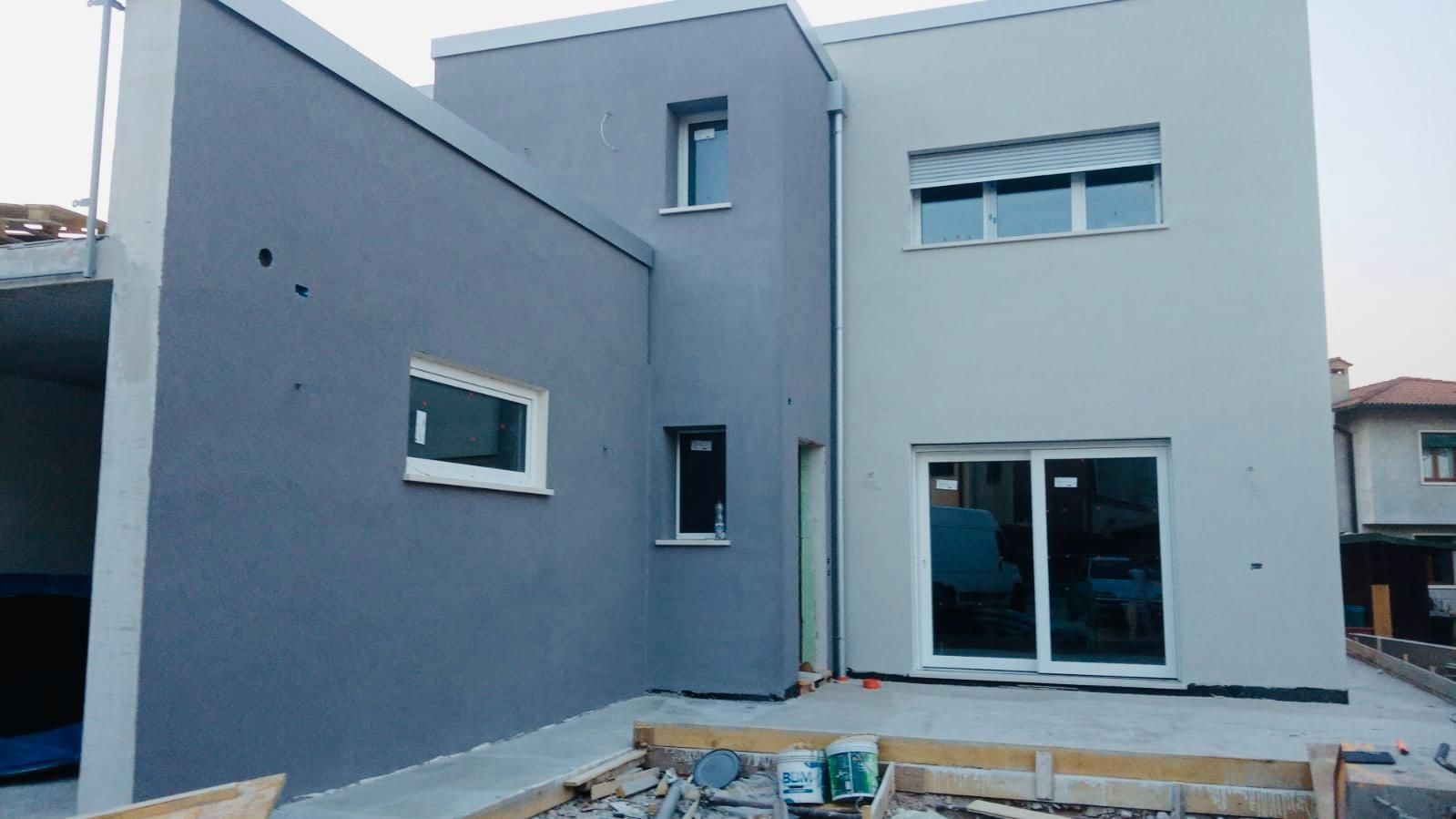 Cappotto in grafite e intonachino