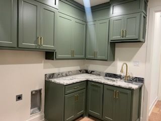 Green Kitchen Cabinet — Lubbock, TX — Phoenix Rising Renovations LLC