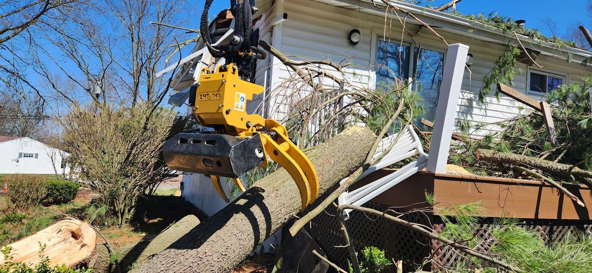 Yellow Crane is Cutting Down a Tree — Masury, OH — Hackett's Tree Service