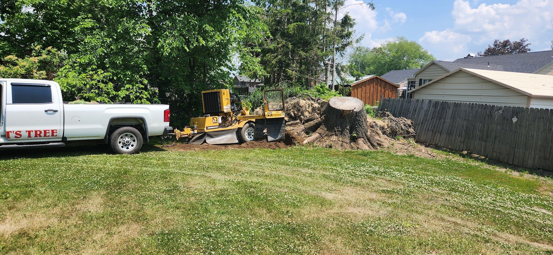White Truck is Parked in a Grassy Yard — Masury, OH — Hackett's Tree Service