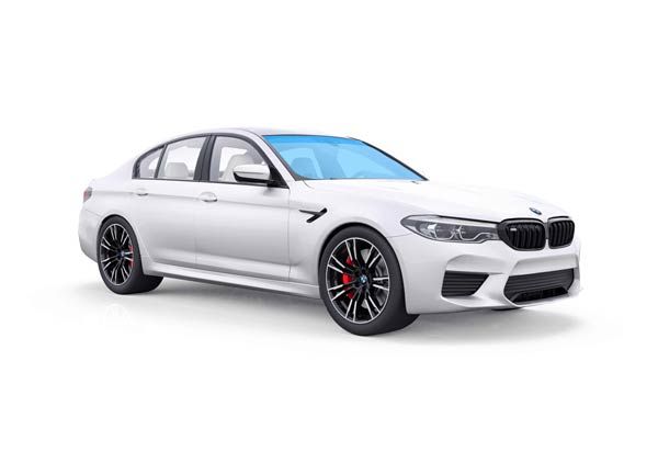 A white bmw m5 is shown on a white background.