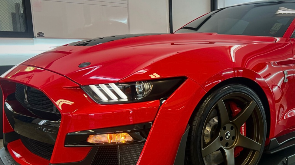 red car with clear bra protection