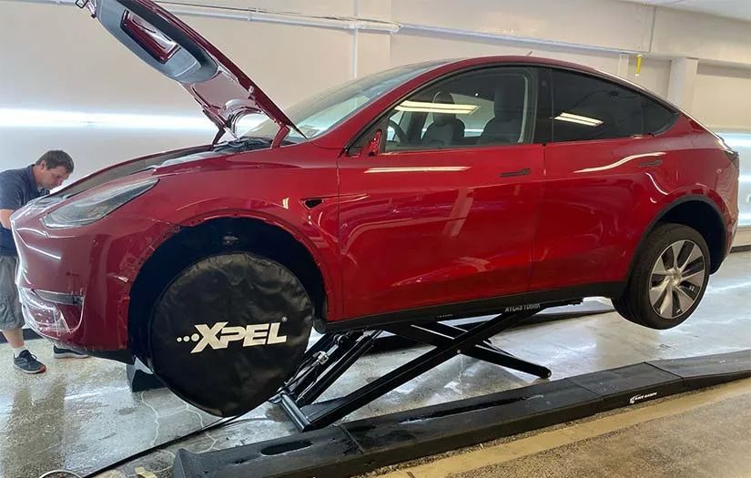 Luxury car with paint protection film in Albany showcasing glossy, showroom-ready finish.