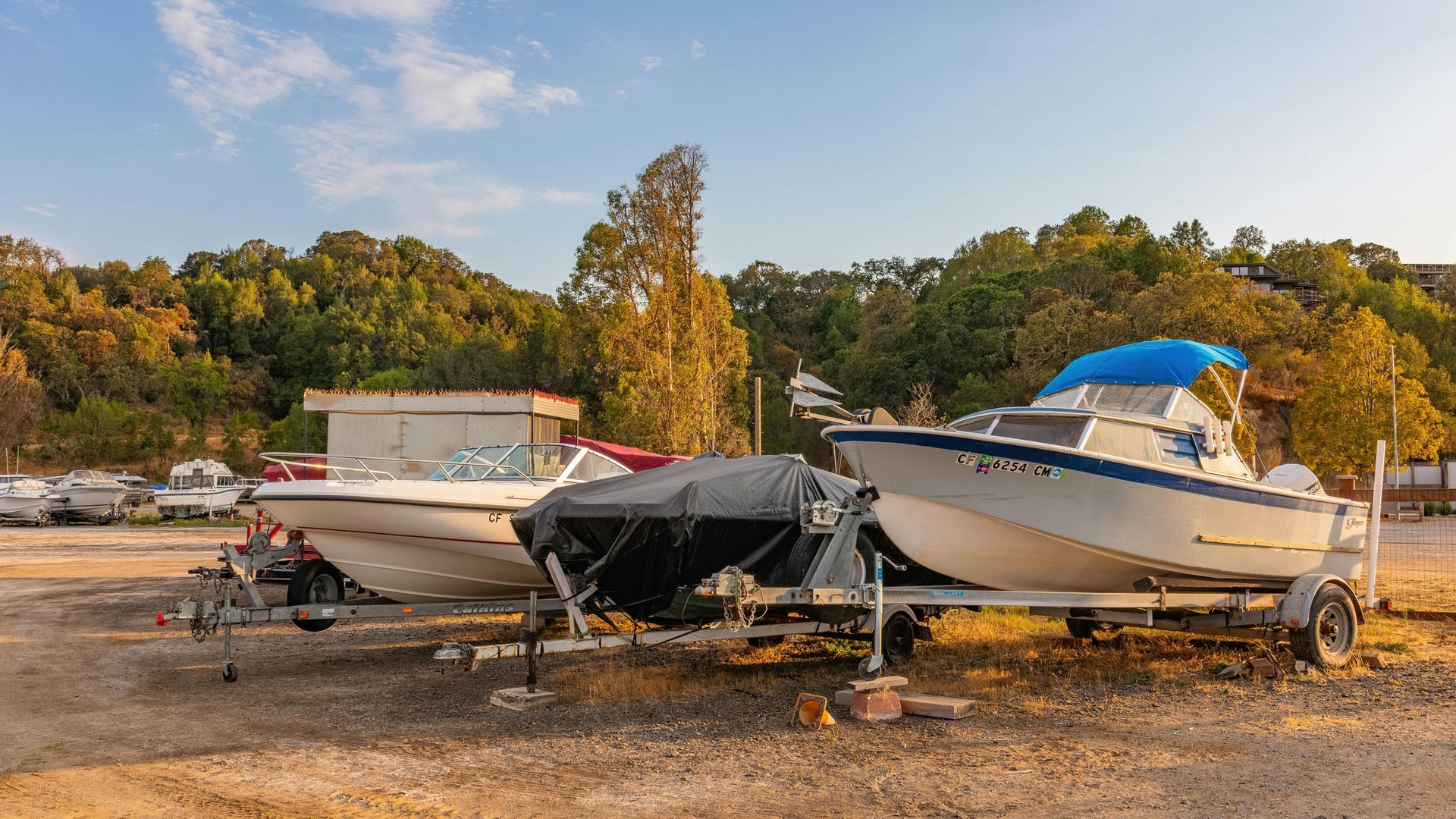 Boats stored outdoors on trailers
