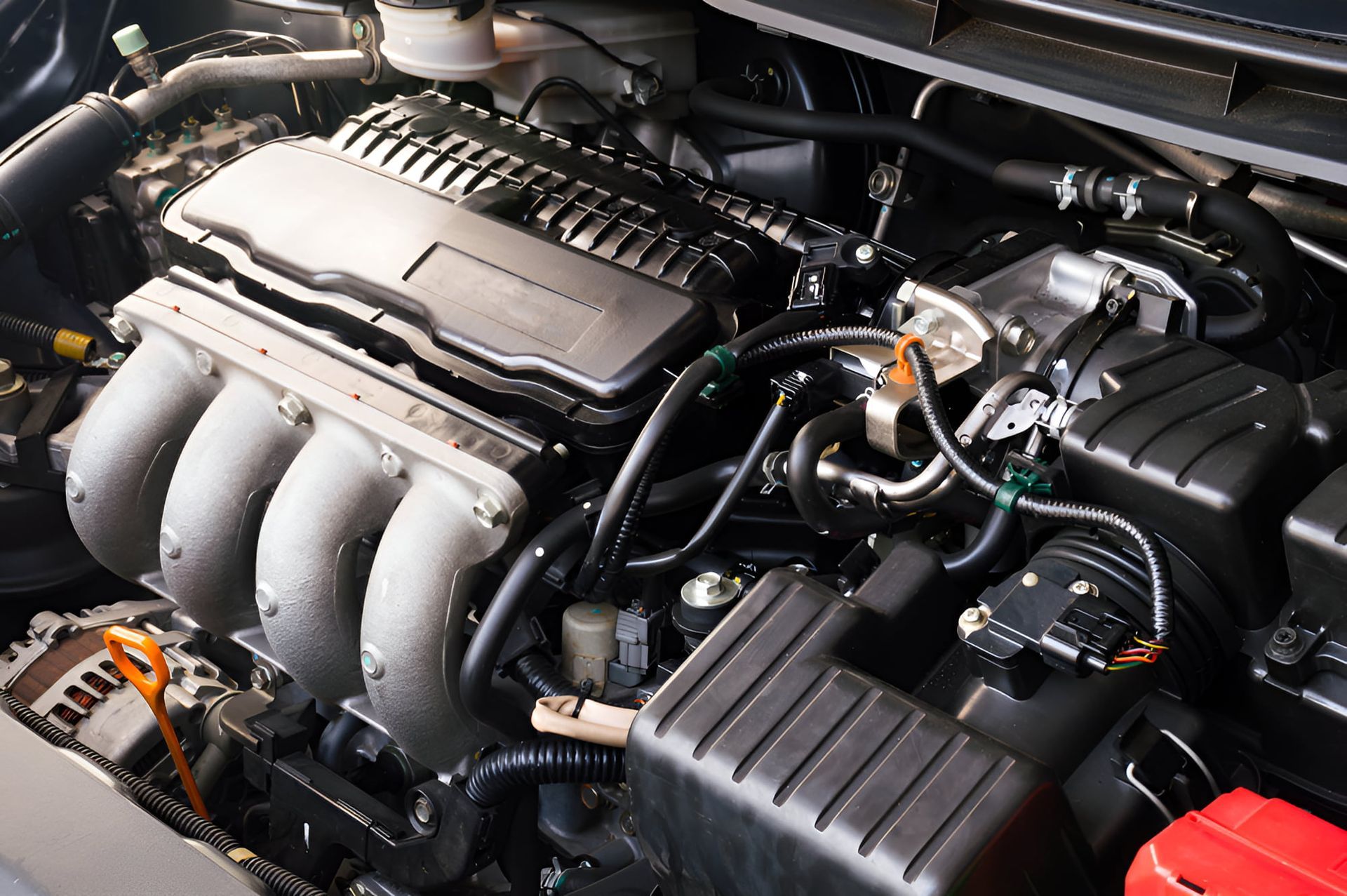 A Close Up of a Car Engine With the Hood Open — Mechanical World In Wagga Wagga, NSW